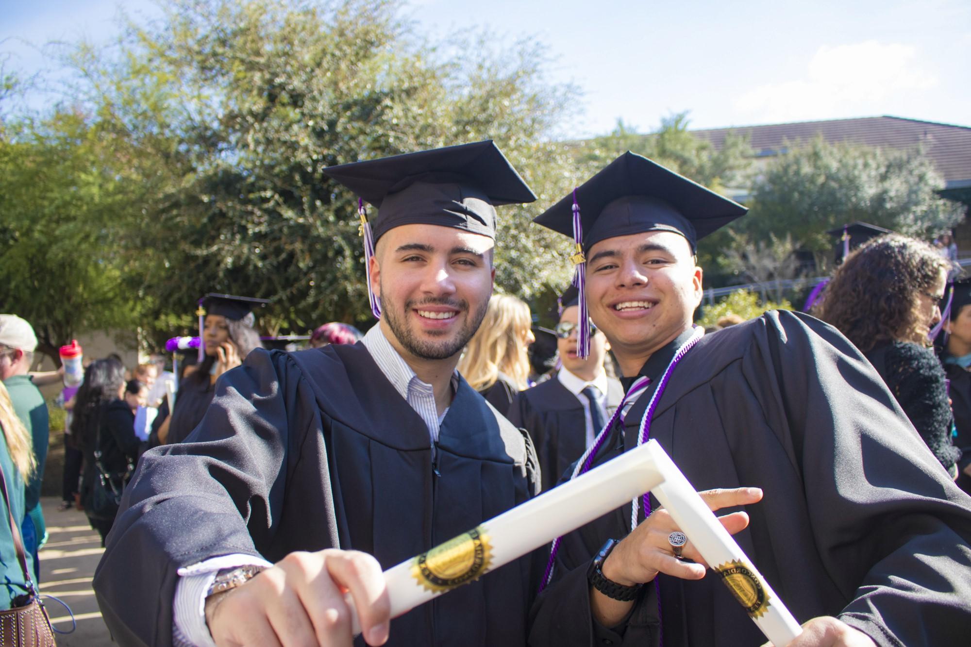 Two proud graduates